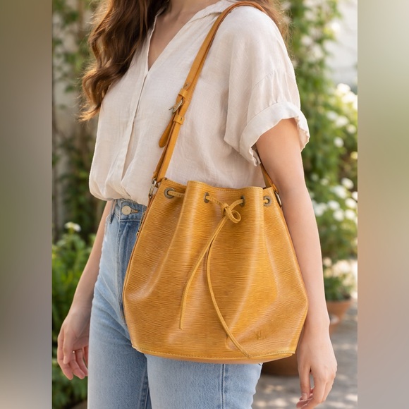 Louis Vuitton Handbags - Louis Vuitton Vintage Bucket Bag add Guitar Strap to Crossbody! Authentic As Is